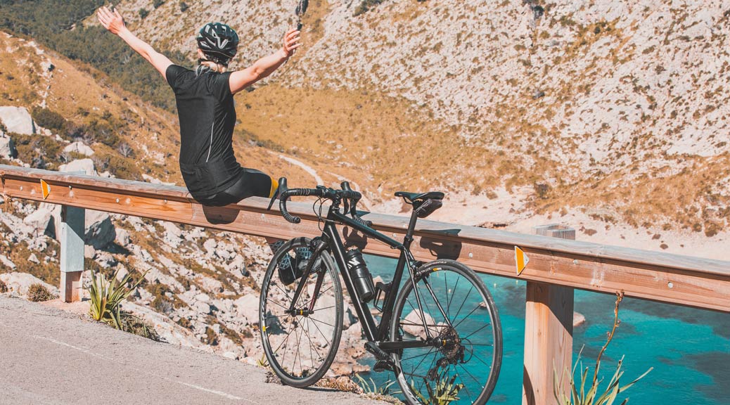 Cycling Girl on hill side Majorca